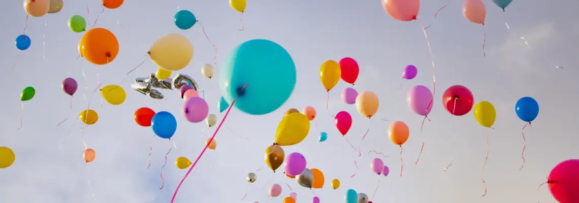 An image of balloons being released into the air.